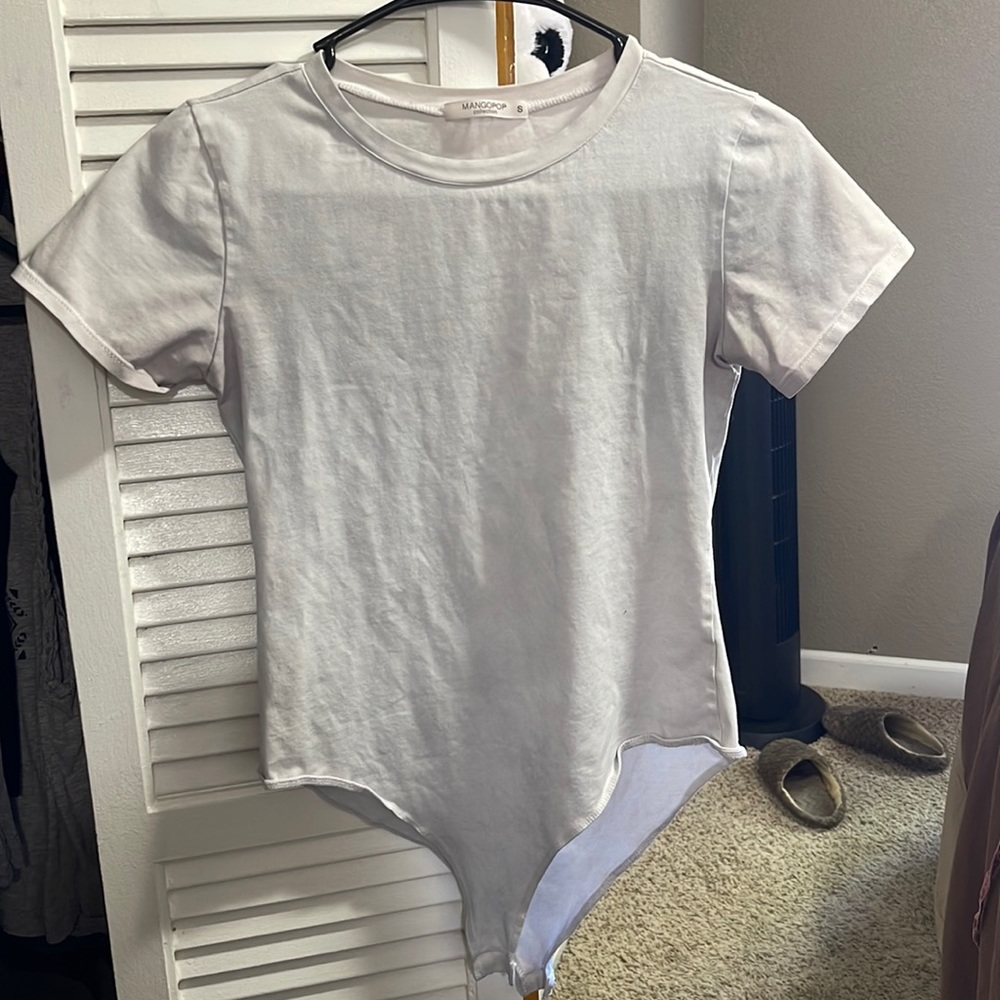 White tshirt bodysuit. Size small. Mango pop collection brand. Super comfy.